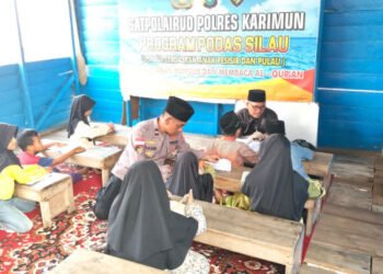 PODASSILAU, Cara Polres Karimun Dekatkan Pendidikan ke Anak Pesisir